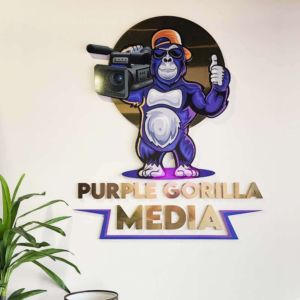 Graphic Design_Universal Sign and Graphics 2022 Custom Business Signs 1000x1000_Purple Gorilla Media Lobby Sign