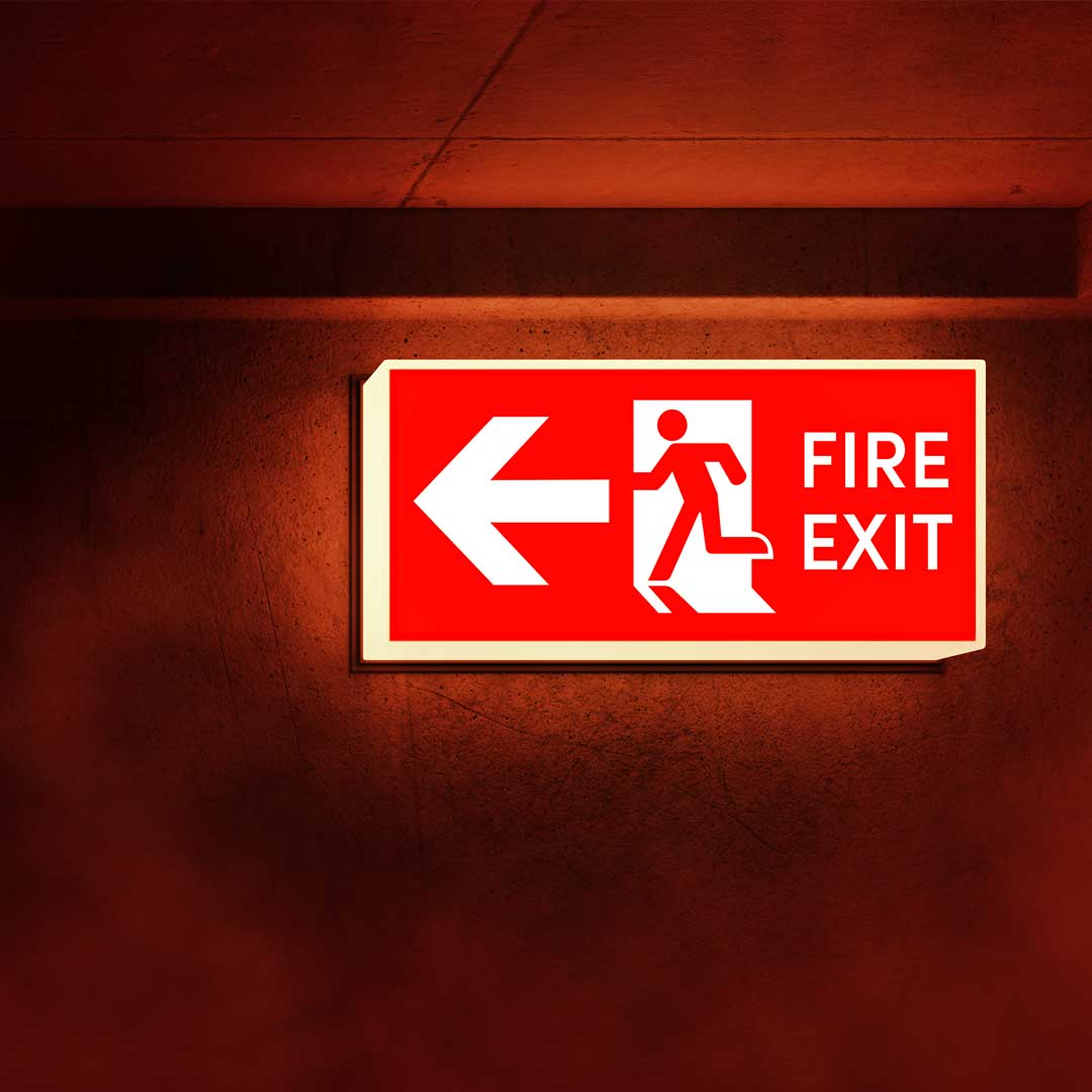 Emergency exit lighting sign red color